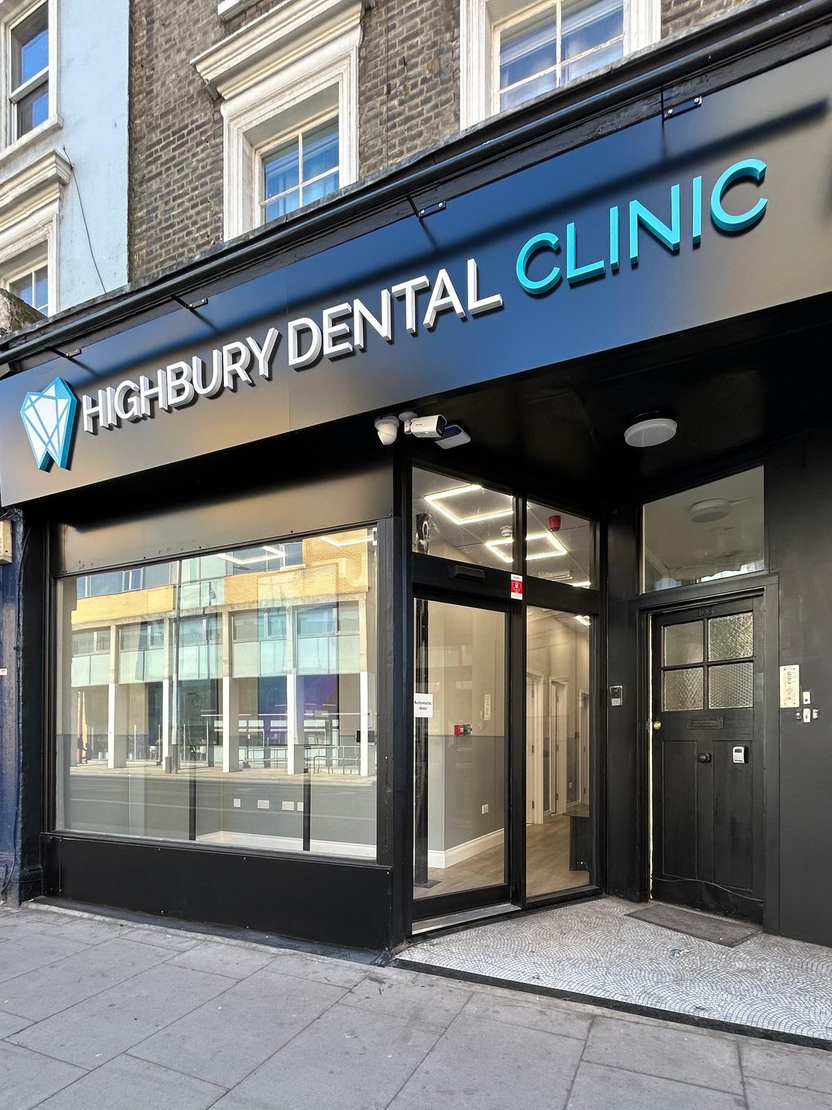 The entrance of Highbury Dental Clinic at 103 Holloway Road